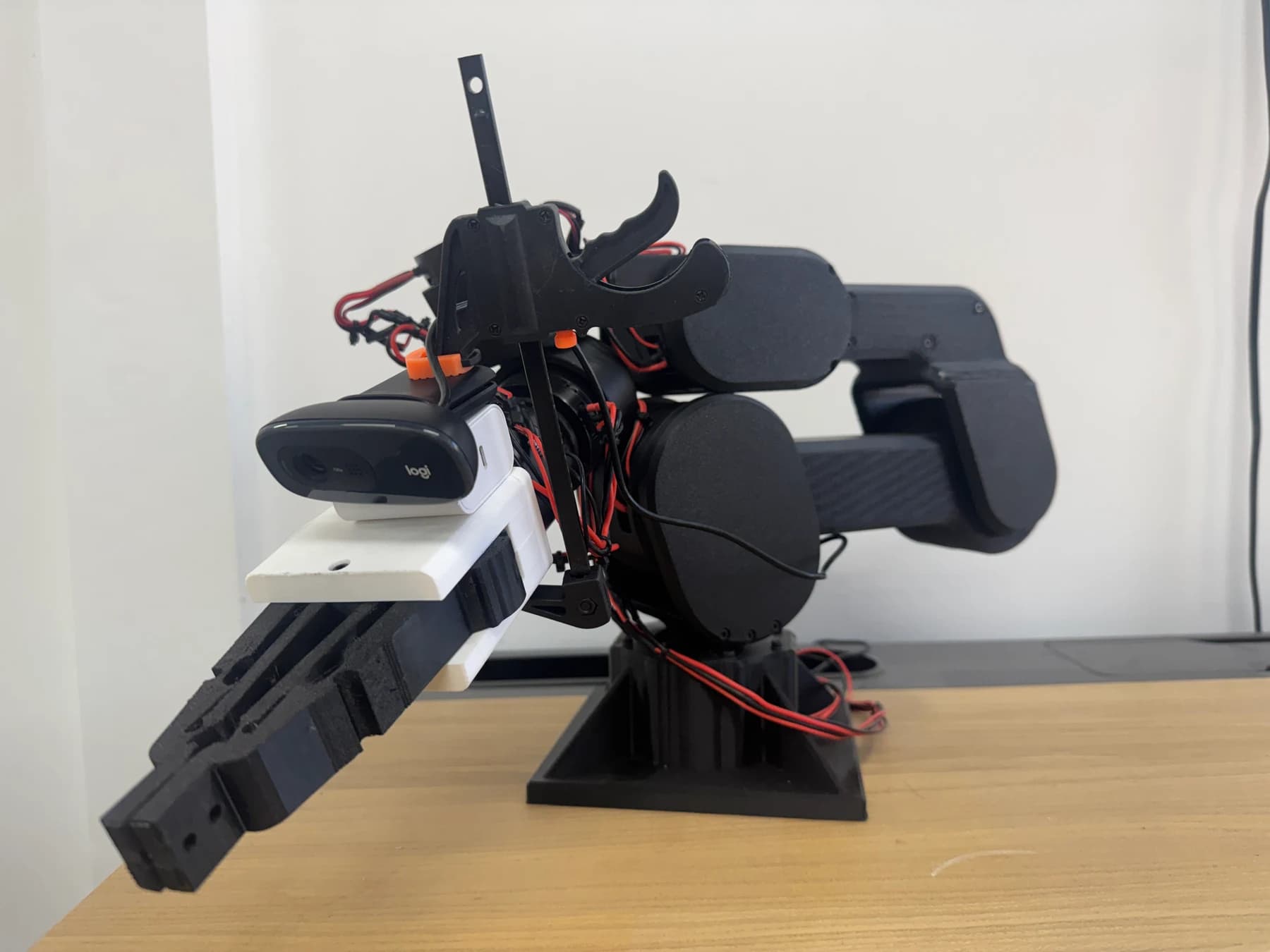 A3 robot arm on a workbench, fitted with a gripper and camera.